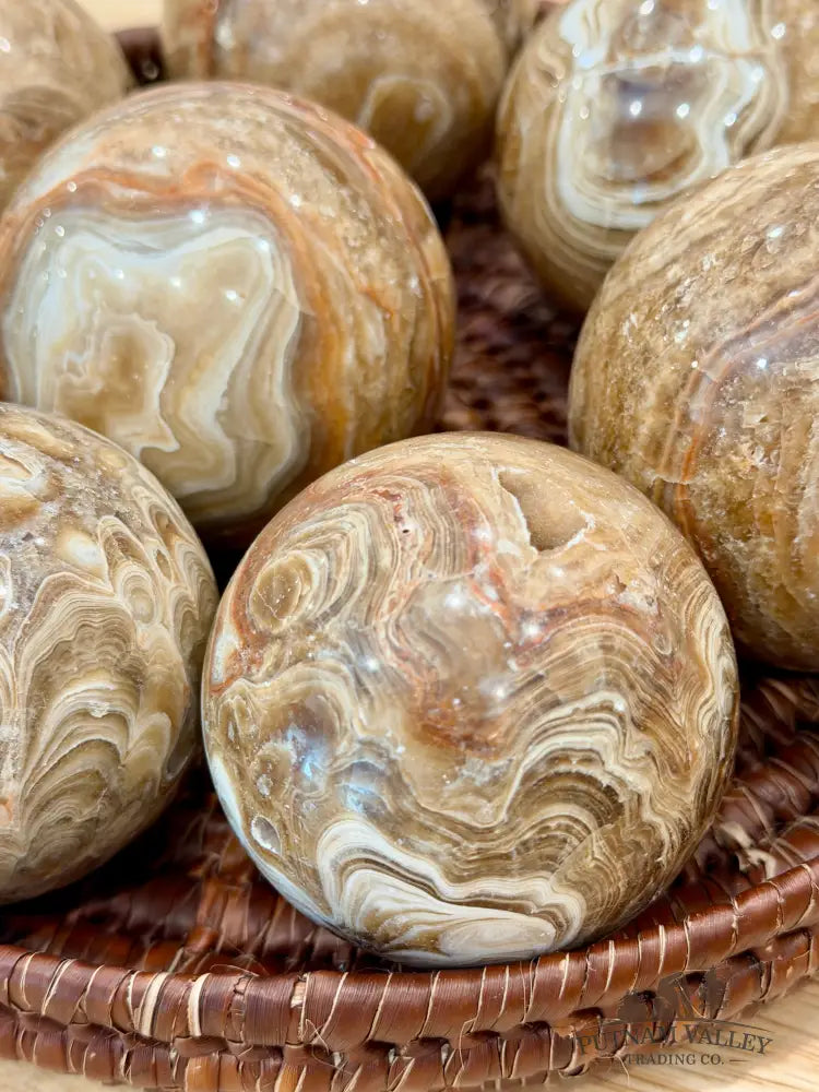 Amber Calcite Spheres - Sphere