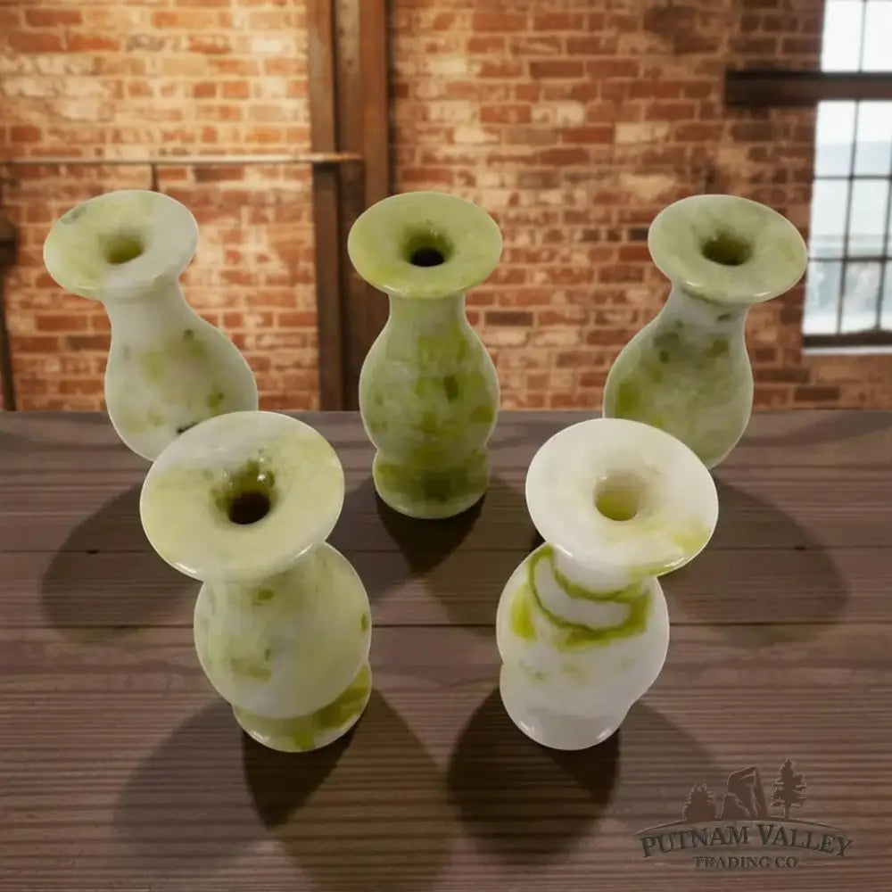 Putnam Valley Trading Co. Lantian jade small vase with unique green and white marbled patterns on a wooden surface.