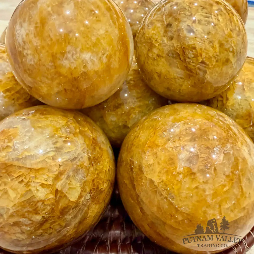 Reserve Golden Healer Quartz Spheres - Tumbled Stone