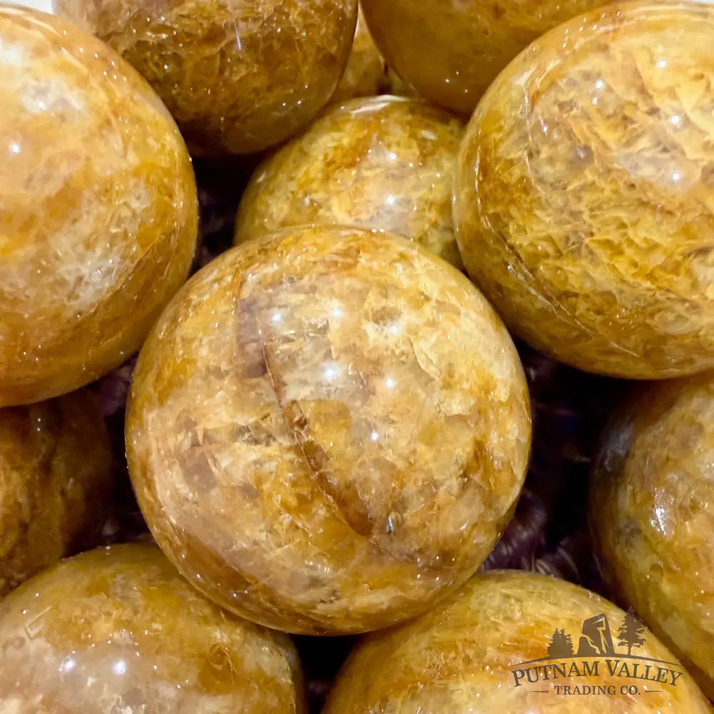 Reserve Golden Healer Quartz Spheres - Tumbled Stone